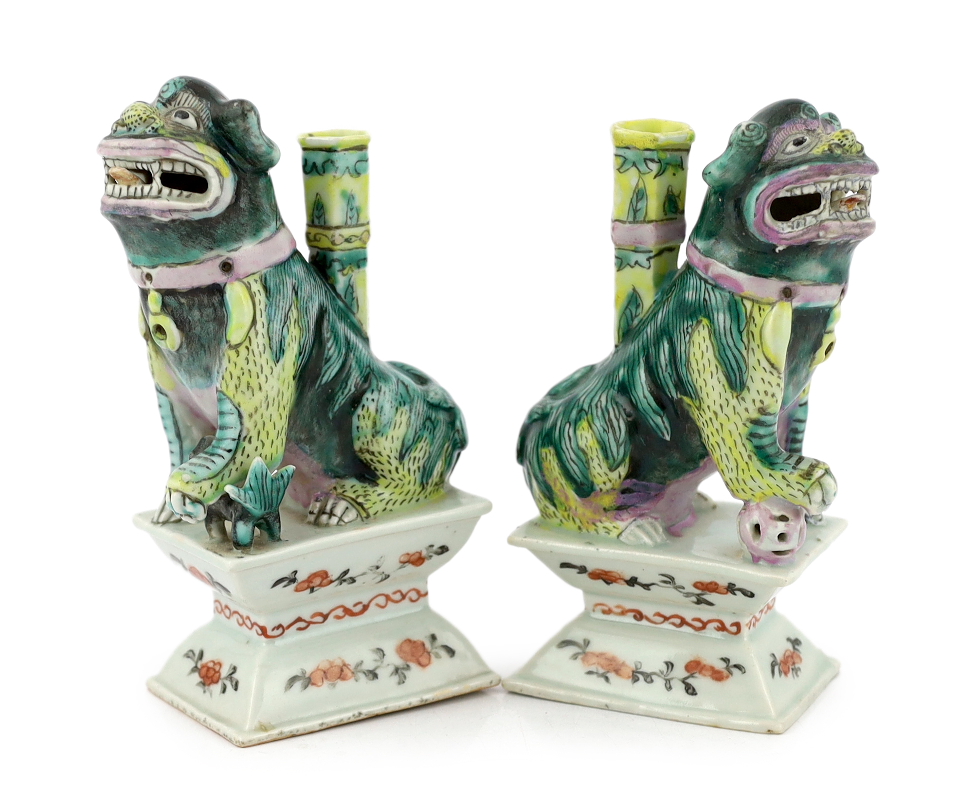 A pair of Chinese enamelled porcelain ‘Buddhist lion’ joss stick holders, early 19th century
